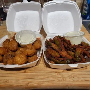 two takeout containers of fried food