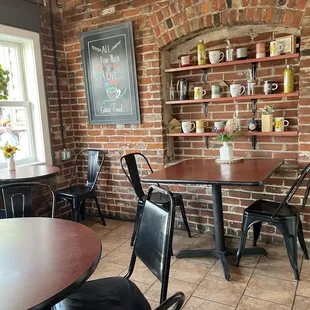 tables and chairs in a coffee shop