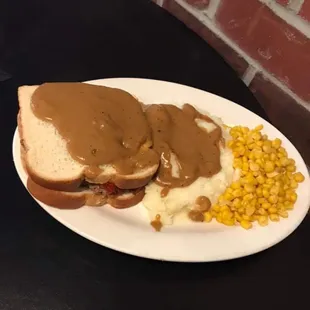 a plate of mashed corn and gravy