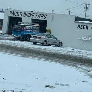 a truck parked in front of a building