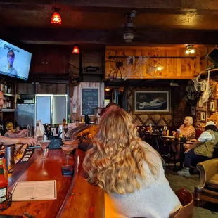 people sitting at the bar