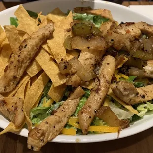 Chicken Fajita Salad $14, but to add the chicken costs an additional $8.