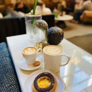 Meyer lemon danish with poppy seed, caramel vanilla cappuccino, and 16oz lavender cardamom latte.