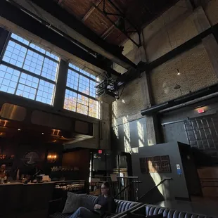 The original Duffey Paper Co. machinery is still all over the space and well integrated.