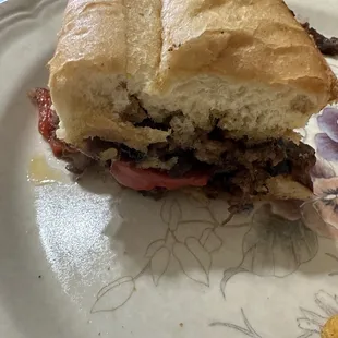 Half of the Philly cheese steak sandwich.....