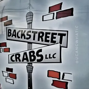 a street sign with a microphone on it