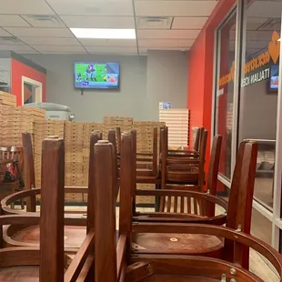 a row of chairs in a restaurant
