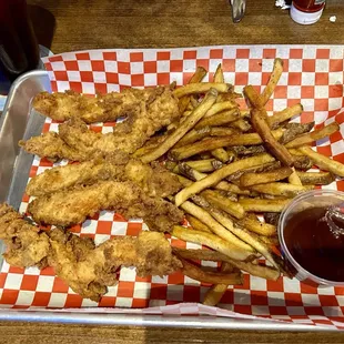 Chicken tenders and fries with bbq sauce