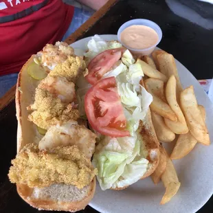 Po boy stuffed with fried shrimp and oysters
