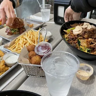 Southwest salad with pulled pork on the right - great portion size! Hush puppies, fries, and zucchini fries were all good