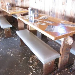 a table and benches in a restaurant