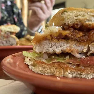 Juicy Pig (front)  BBQ hamburger back.