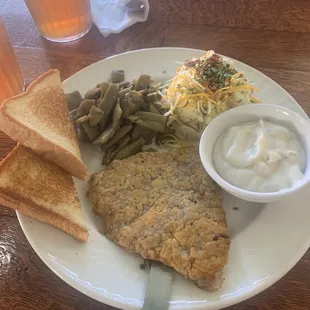 Small chicken fried steak. Gravy comes on the side