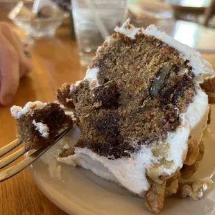 a piece of cake on a plate with a fork
