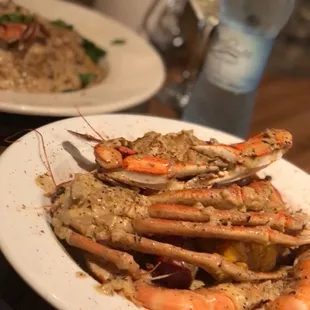 two plates of cooked crabs