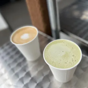 two cups of coffee on a table