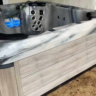 Installing the hot tub.