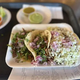 Two pastor.  Far left. Two asada on the right.   Their red spicy salsa was fire. Actually had a kick.