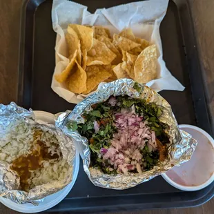 Chips and salsa, veggie Papa Loca, and Al Pastor Papa Loca