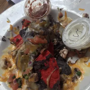Nachos added chicken and black beans, already ate some before I remembered to take a picture.