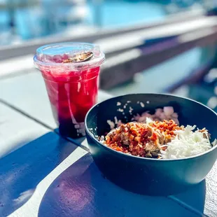 a bowl of rice and a drink