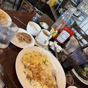 That&apos;s the Bavo Omelette +  and to the right is the Veggie Skillet w avocado and sausage link   w basil pesto and my coffee