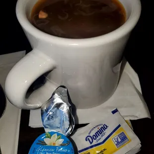 Hot Coffee , Flavored Cream And Dominoes Sugar (The good stuff!)