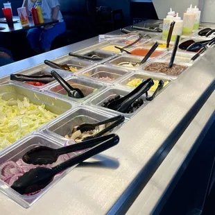 Basic salad bar and burger sauces and fixings