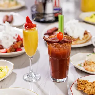a table full of breakfast foods