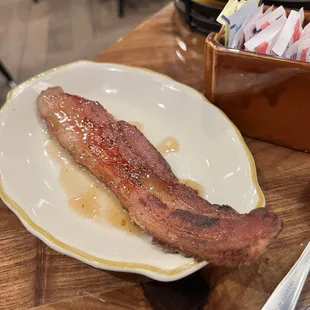 Free slice of bacon for checking in on Yelp!  I got the maple flavor.