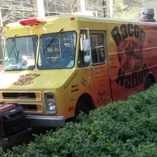 a food truck parked on the side of the road