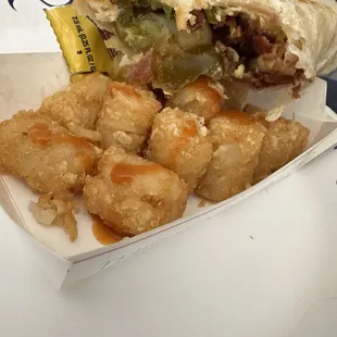 Finally found the jalapeño&apos;s after I ate half of it. Small piece of avocado at the bottom. Disappointed
