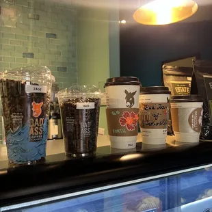 a display of coffees and pastries