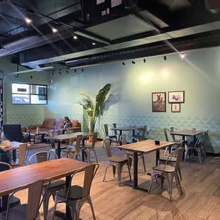 tables and chairs in a coffee shop