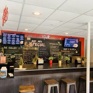 The menu TVs and wall show the variety of options.