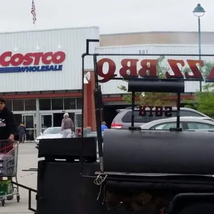 a man pushing a cart full of food