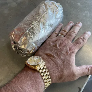 My Hands are XXL, this breakfast burrito is a beast.