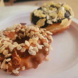 Maple with rice crispies and a croissant doughnut with chocolate and chips on top. Both were dry, tasted like they were left out.