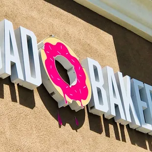 a sign for a donut shop