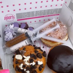 a variety of donuts in a box