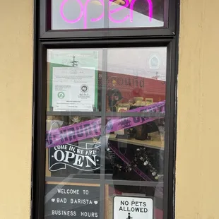 open sign in window of restaurant