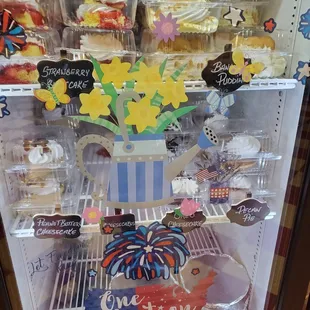 a display of cupcakes and pastries