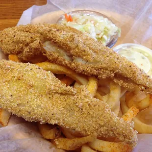 A BBQ curveball worth swinging at:  $4.99 lunch catfish basket.  Two filets, curly fries, slaw, and a couple of hush puppies.