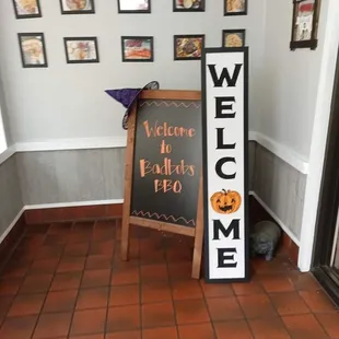 a welcome sign in a restaurant