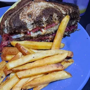 Half my Reuben sandwich - I had already eaten the other half and the dill pickle spear - delicious!