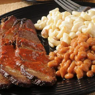 ribs, beans, macaroni and cheese