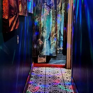 Take a look down the path of inclusion! This is what the future of restrooms look like! They should have signs that say use whatever!