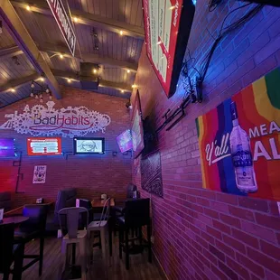 The view you get coming out of the restroom! You see nothing but a sign that says all are welcome! Which is how this establishment feels!