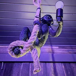 Ask the owner what the significance of the monkey means maybe a downstairs bar? It's a conversation piece. Located upstairs