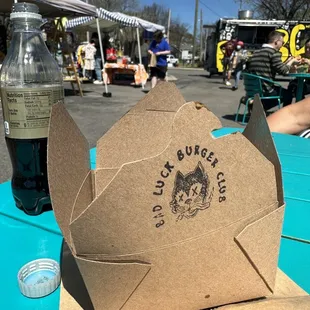 Burgers are served in this cool box.